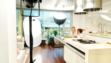 Kitchen studio light setup. Kitchen studio at home, in modern style in bright colors with furniture