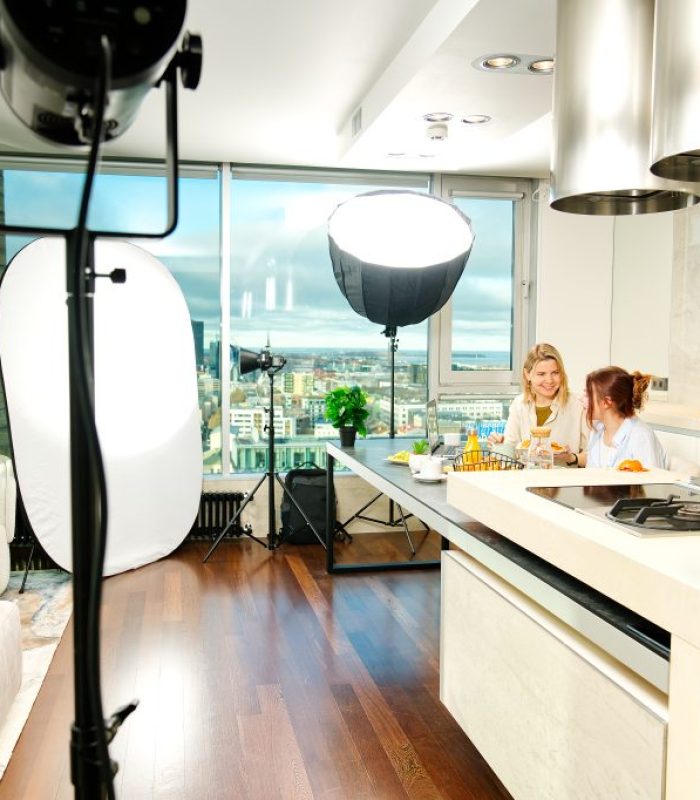 Kitchen studio light setup. Kitchen studio at home, in modern style in bright colors with furniture